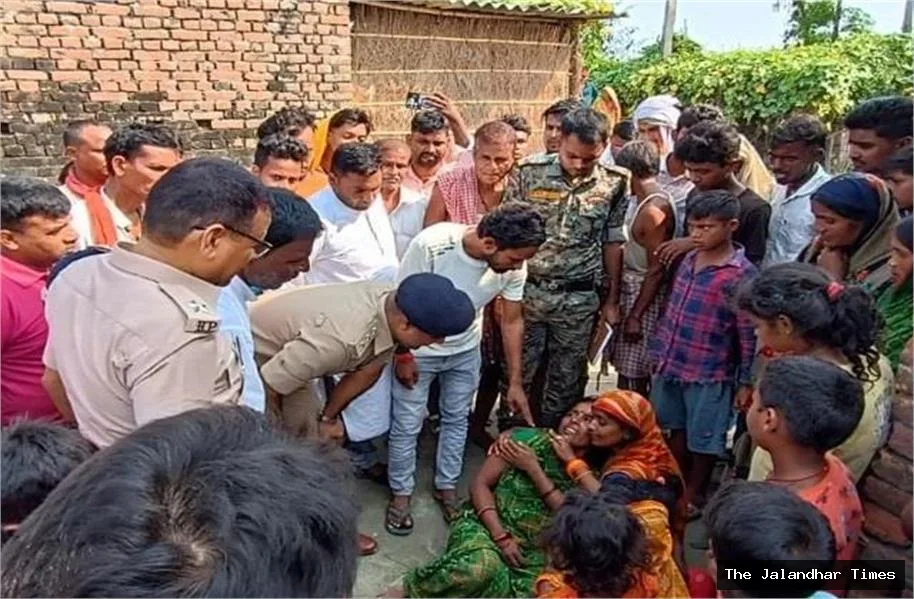Residents gather after four minor girls drowned in a pond in Bankat village of East Champaran, Bihar